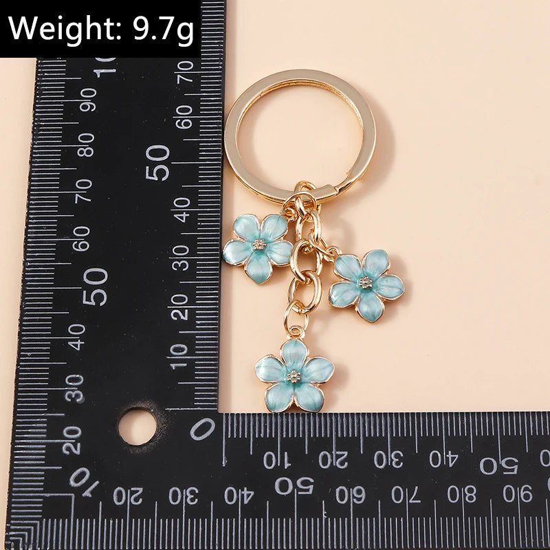 Lilac Enamel Sakura Flower Keychain: Japanese Elegance