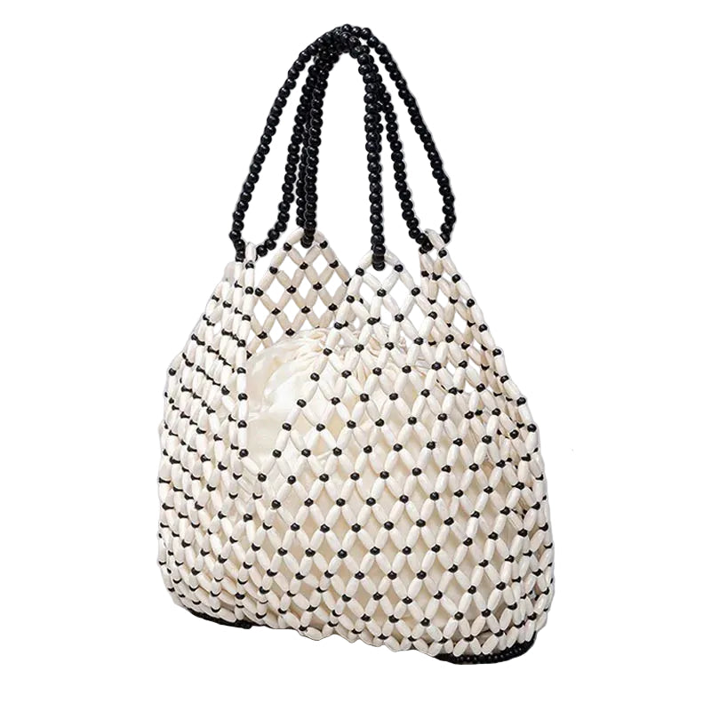 White Beaded Bucket Bag – Artisanal Elegance and Luxurious Openwork Design