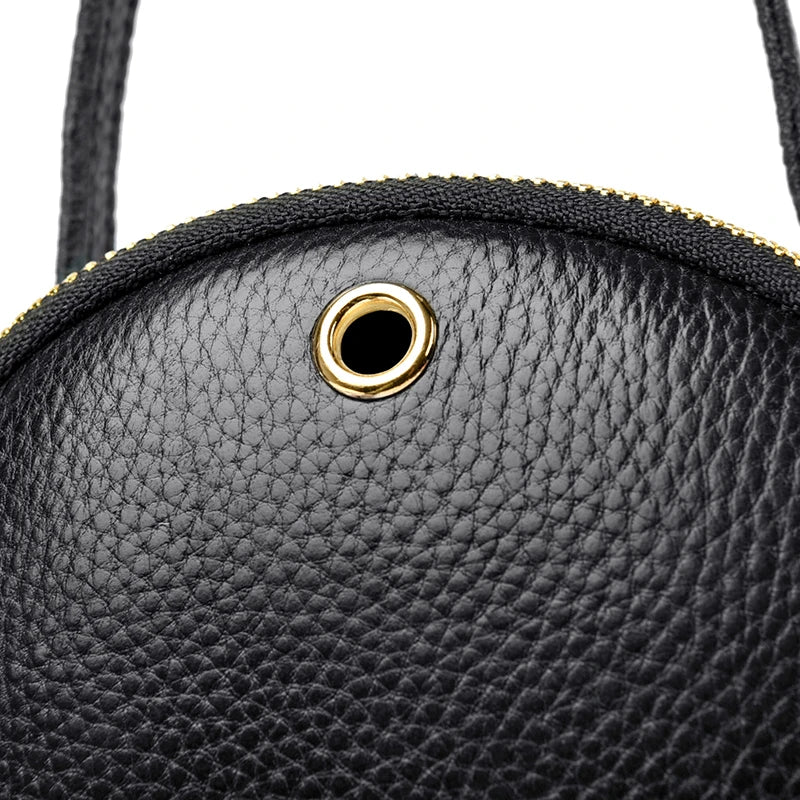 Bolso para Móvil Circular de Piel Auténtica – Lujo Compacto y Versátil