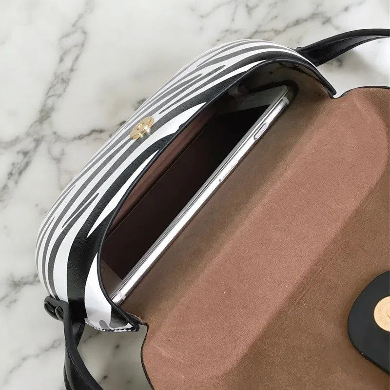 Bolso Bandolera TPU de Broche Cebra