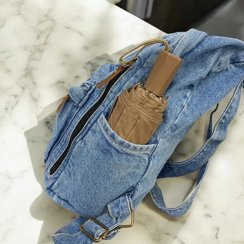 Bolso Mochila Denim con Cierres Laterales Azul Claro