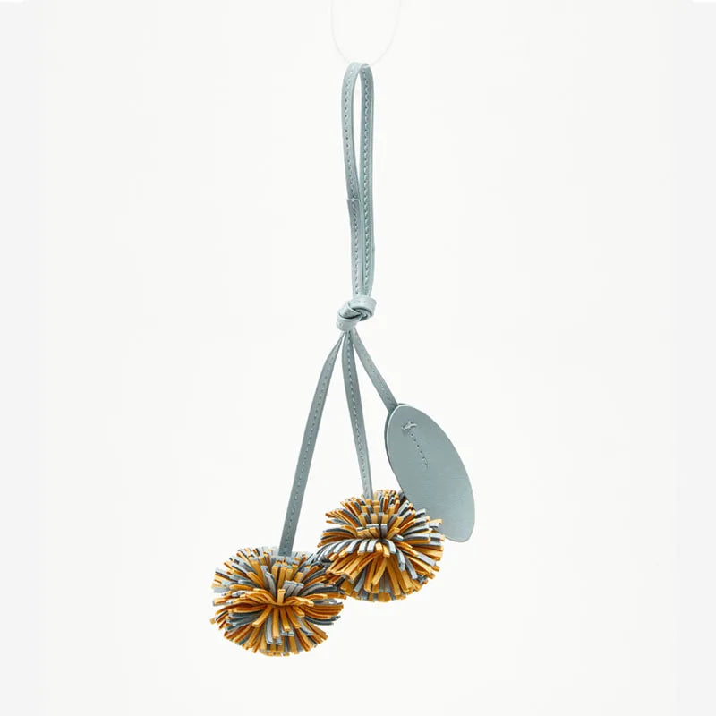 Premium Pom-Pom Charm for Handbag – Glamorous and Fluffy Accessory