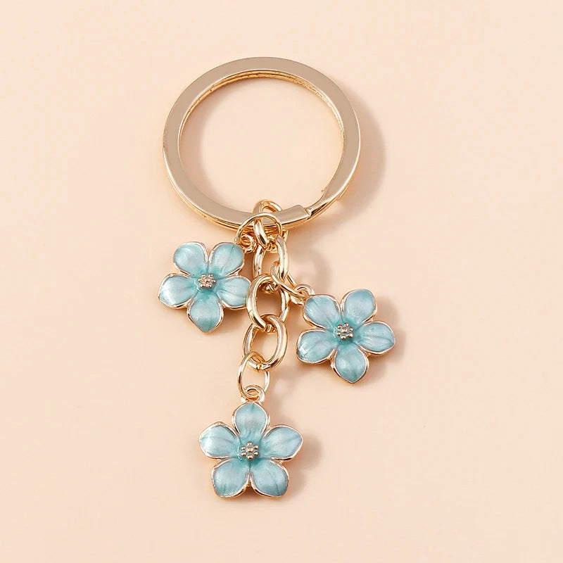 Sky Blue Sakura Flower Charm: The Distinctive Touch for Your Bag