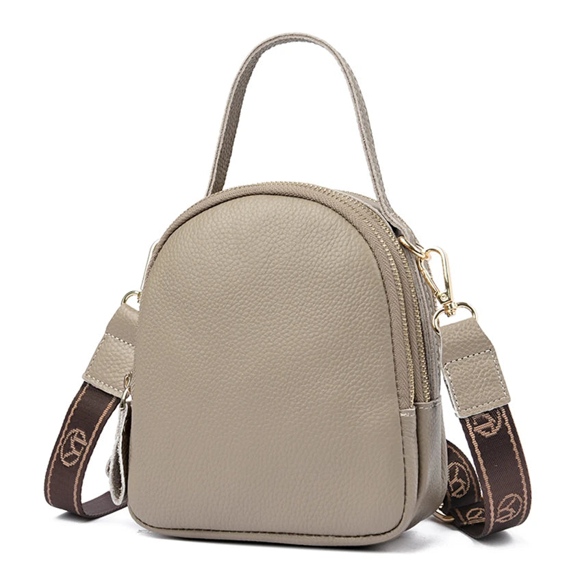 Bolso para Móvil Circular de Piel Auténtica – Lujo Compacto y Versátil